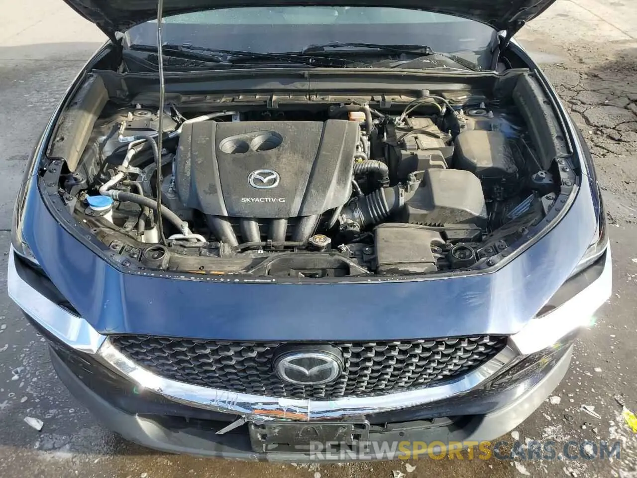 12 Photograph of a damaged car 3MVDMBBL1MM318977 MAZDA CX30 2021