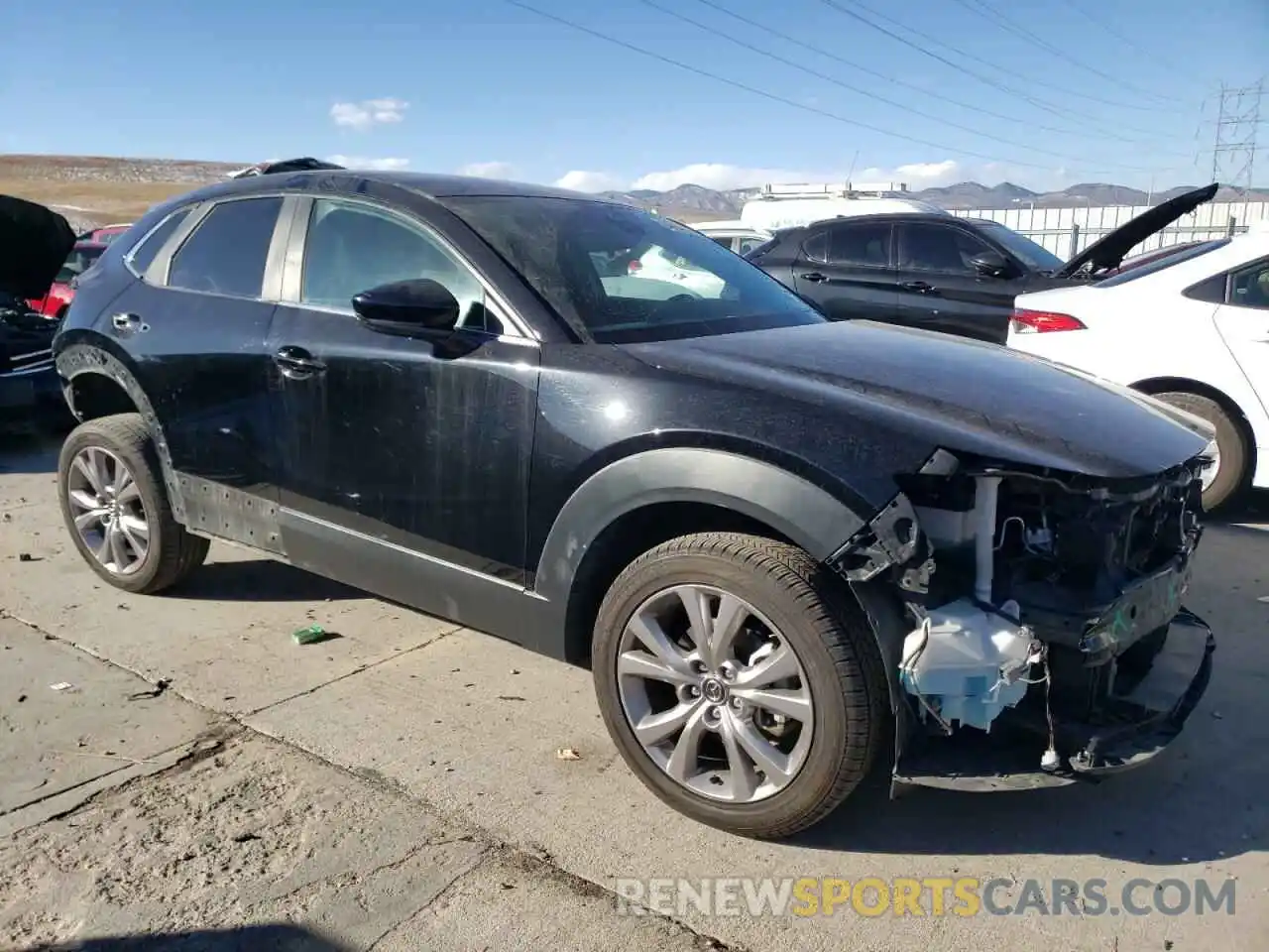 4 Photograph of a damaged car 3MVDMBBL9MM228234 MAZDA CX30 2021