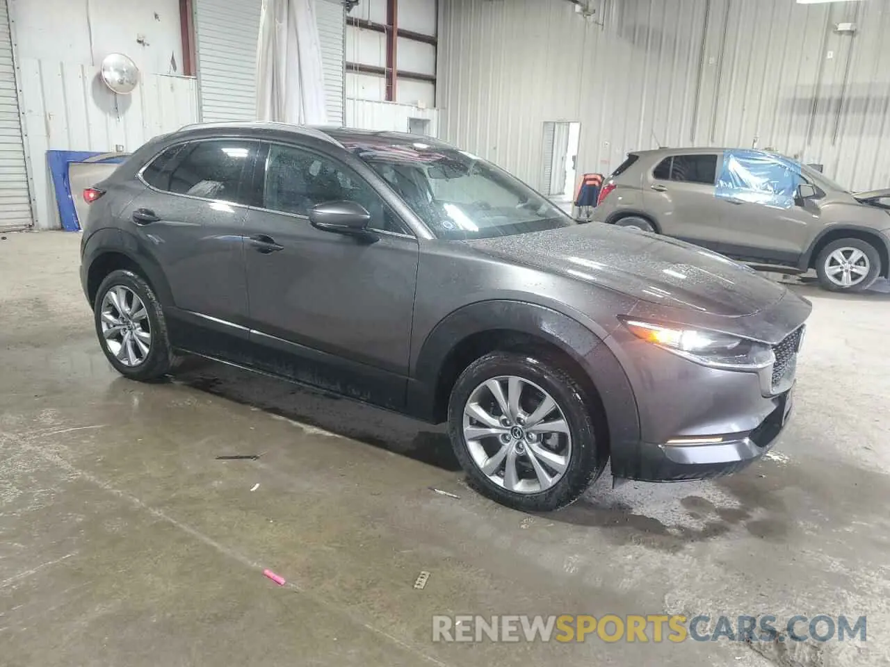 4 Photograph of a damaged car 3MVDMBDL8MM261593 MAZDA CX30 2021