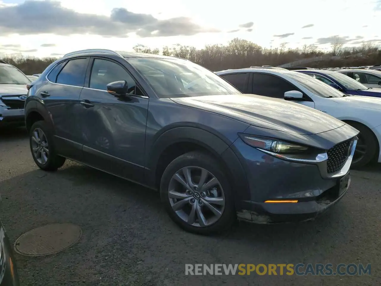 4 Photograph of a damaged car 3MVDMBDM2MM220739 MAZDA CX30 2021