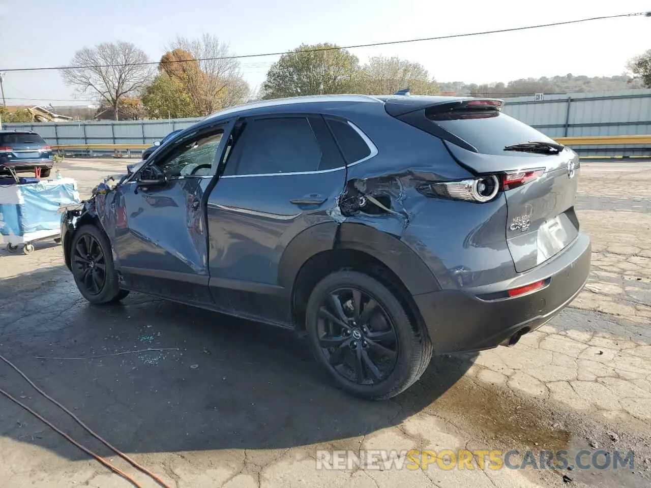 2 Photograph of a damaged car 3MVDMBEYXMM230372 MAZDA CX30 2021