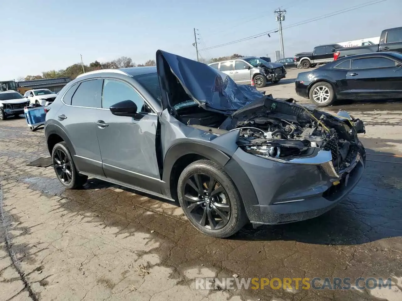 4 Photograph of a damaged car 3MVDMBEYXMM230372 MAZDA CX30 2021
