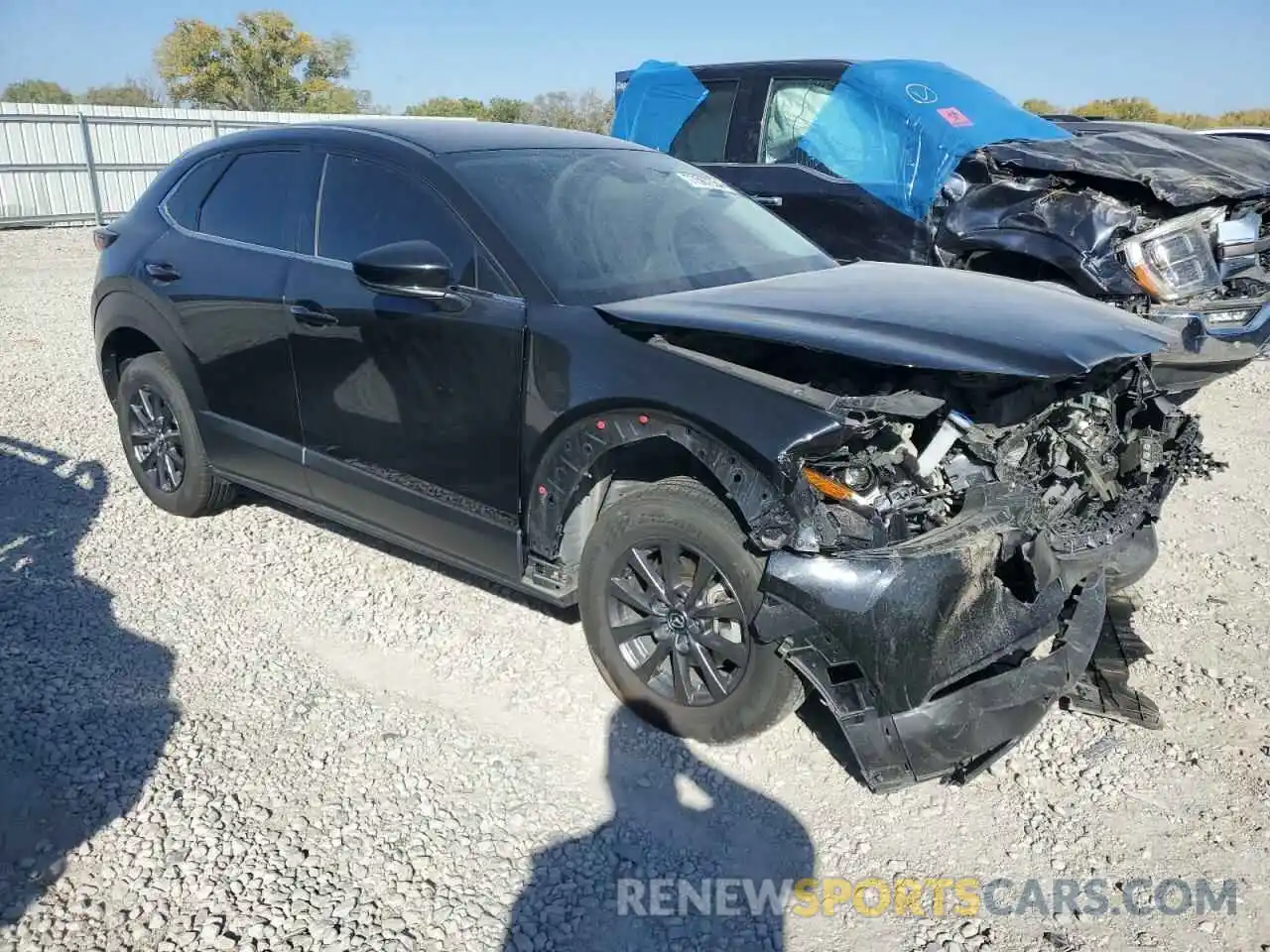 4 Photograph of a damaged car 3MVDMBAL9NM415122 MAZDA CX30 2022