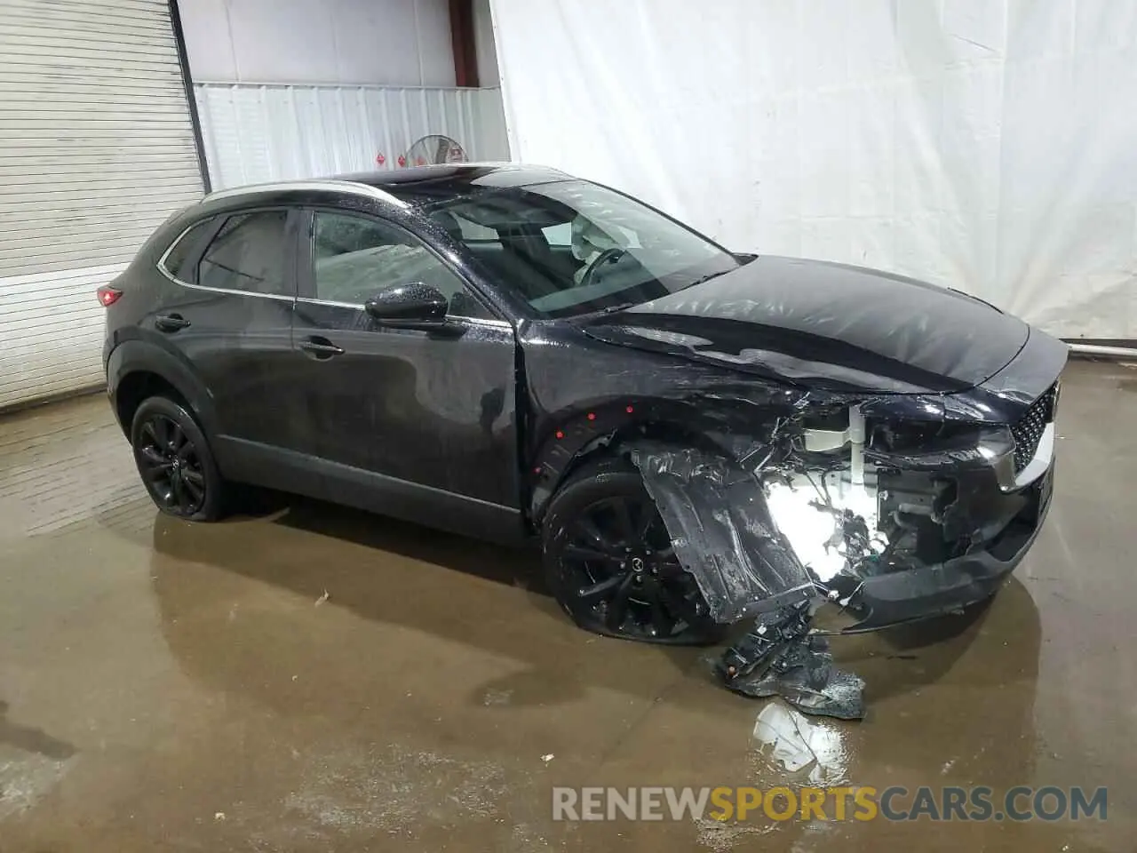 4 Photograph of a damaged car 3MVDMBAY4NM429098 MAZDA CX30 2022