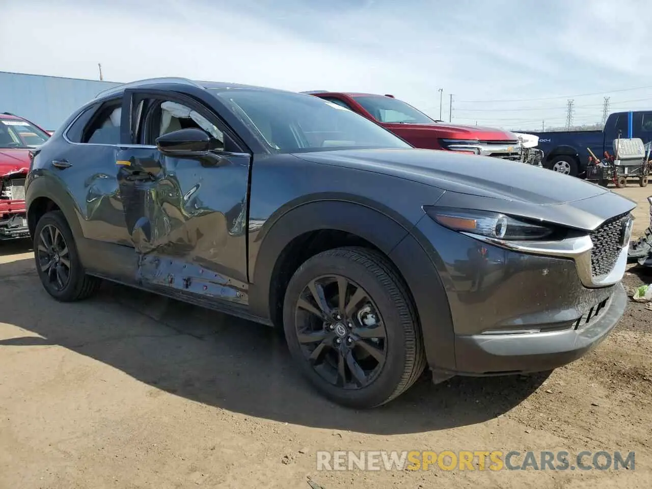 4 Photograph of a damaged car 3MVDMBAY8NM438421 MAZDA CX30 2022