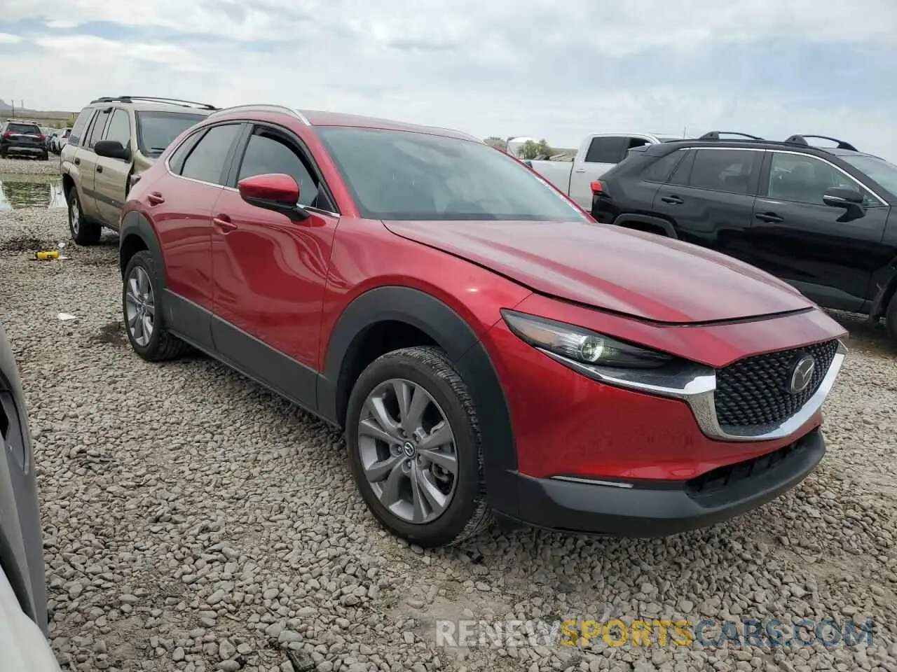 4 Photograph of a damaged car 3MVDMBBL0NM409577 MAZDA CX30 2022