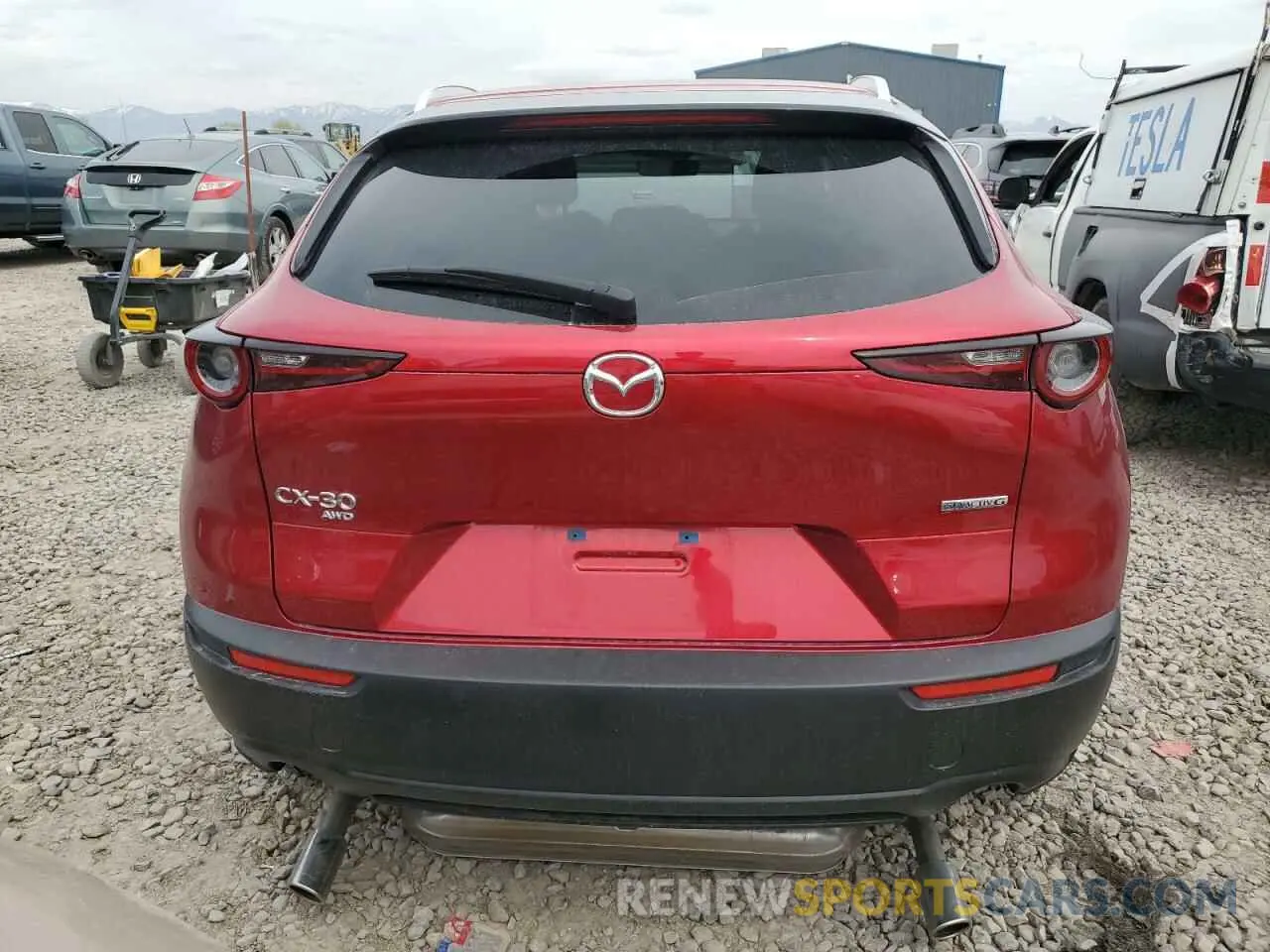 6 Photograph of a damaged car 3MVDMBBL0NM409577 MAZDA CX30 2022