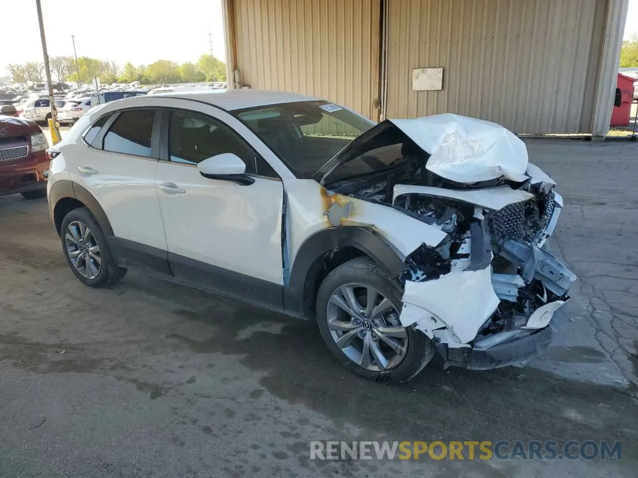 4 Photograph of a damaged car 3MVDMBBL0NM457547 MAZDA CX30 2022