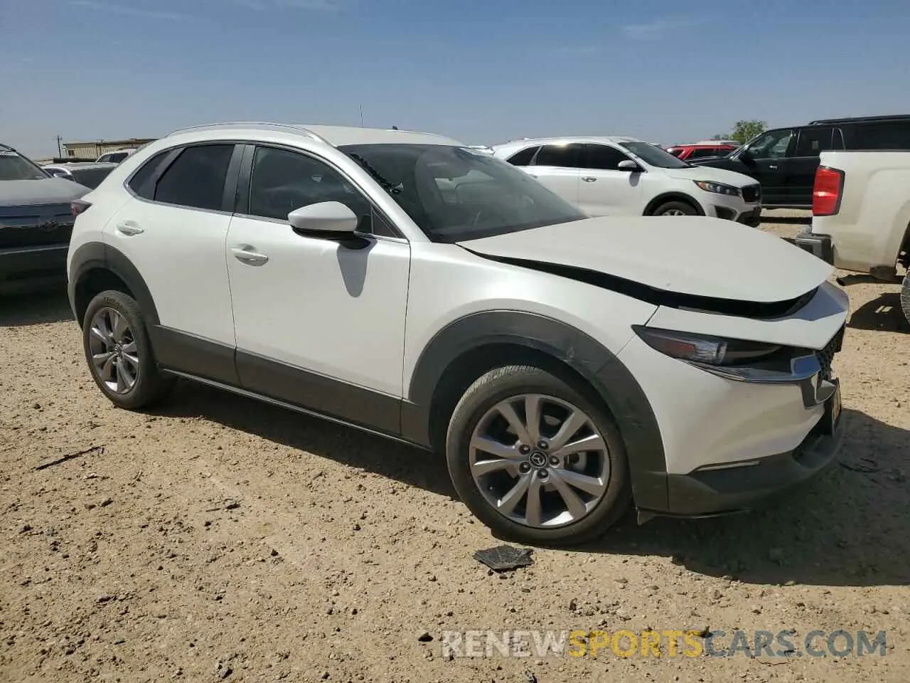 4 Photograph of a damaged car 3MVDMBBL1NM403335 MAZDA CX30 2022