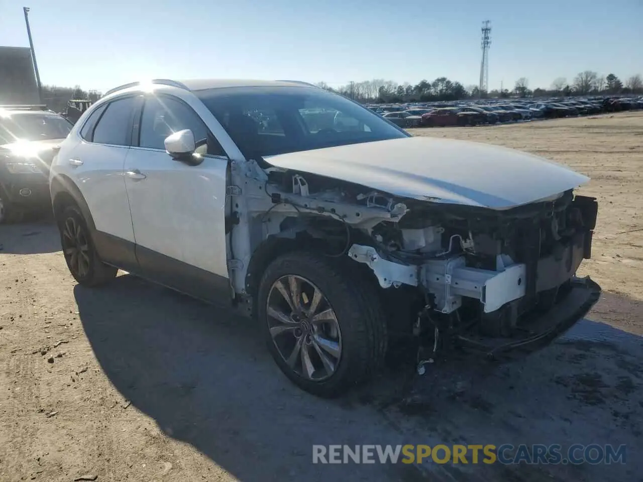 4 Photograph of a damaged car 3MVDMBBL7NM400276 MAZDA CX30 2022