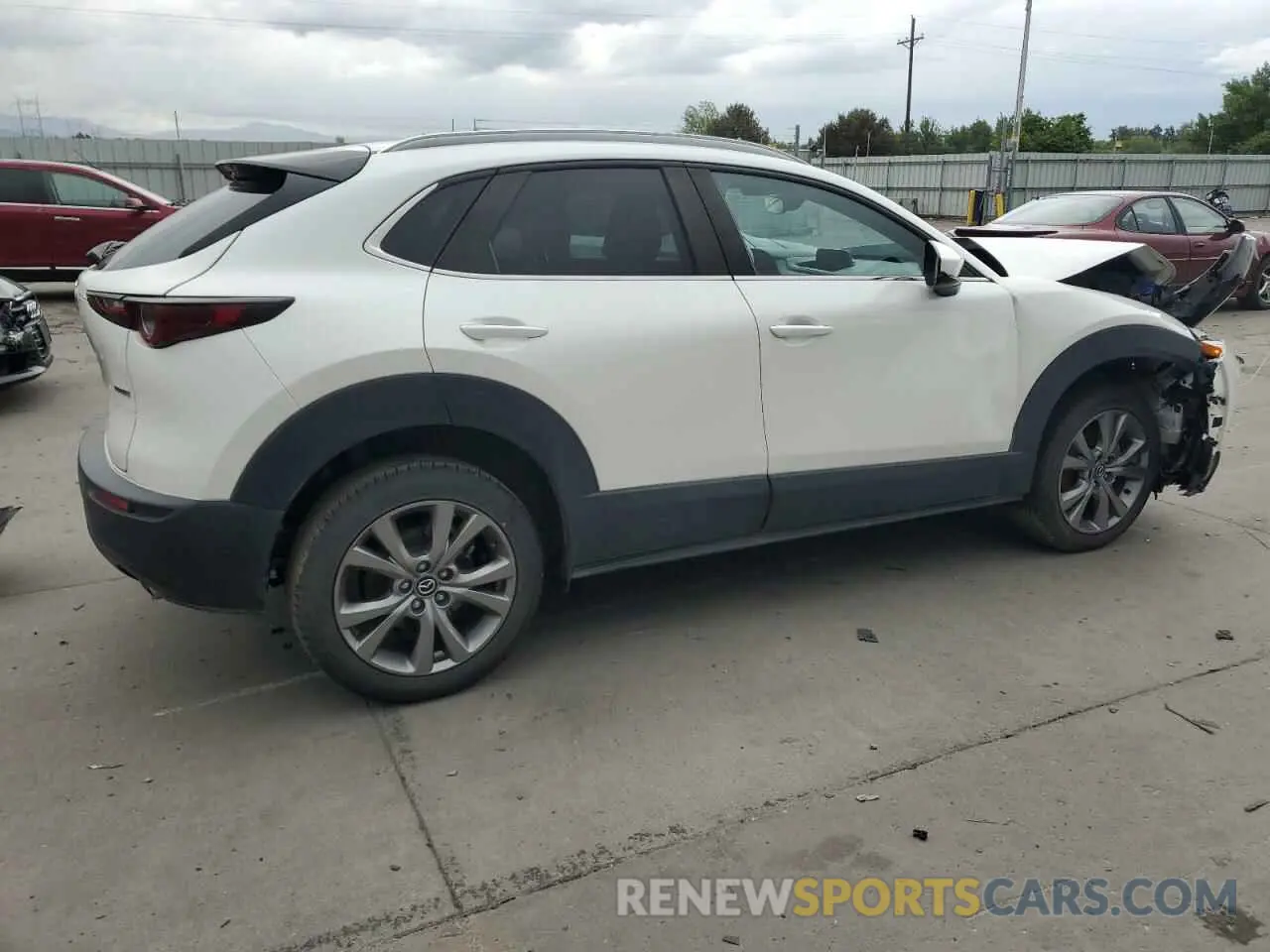 3 Photograph of a damaged car 3MVDMBBL9NM411859 MAZDA CX30 2022