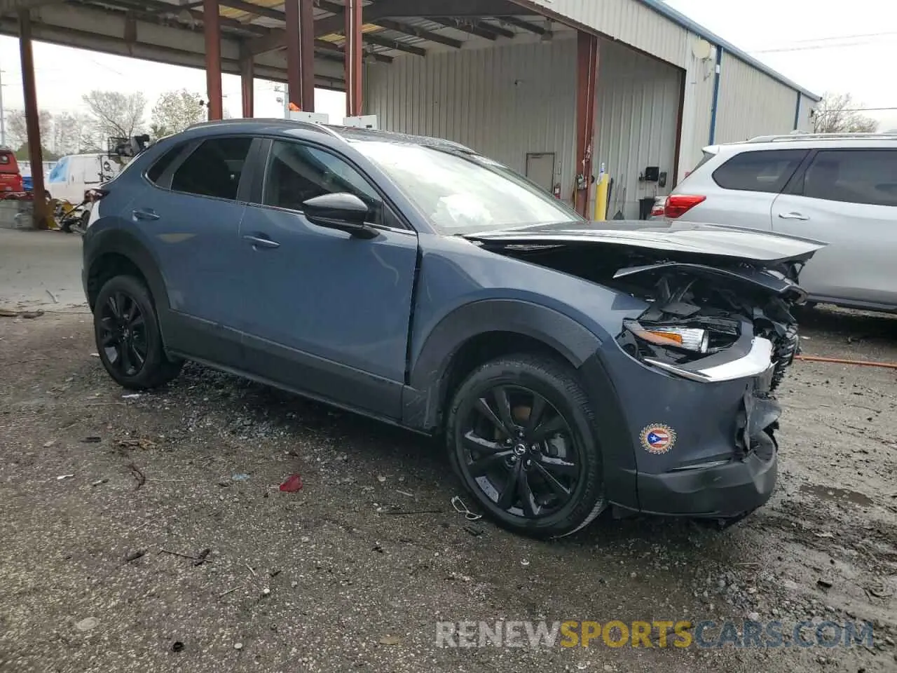 4 Photograph of a damaged car 3MVDMBCL0NM400960 MAZDA CX30 2022