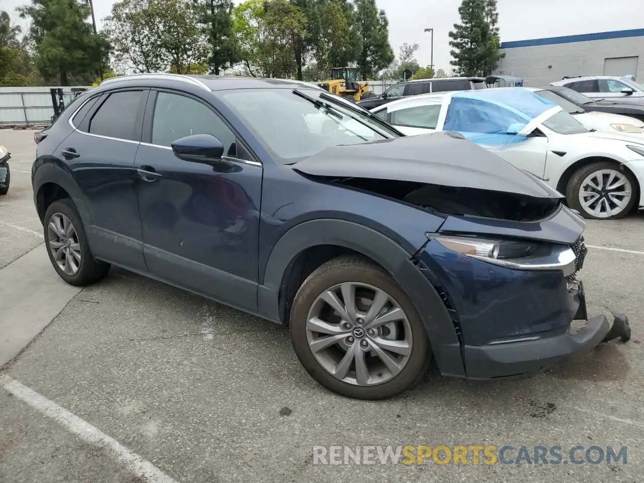 4 Photograph of a damaged car 3MVDMBCL4NM450891 MAZDA CX30 2022
