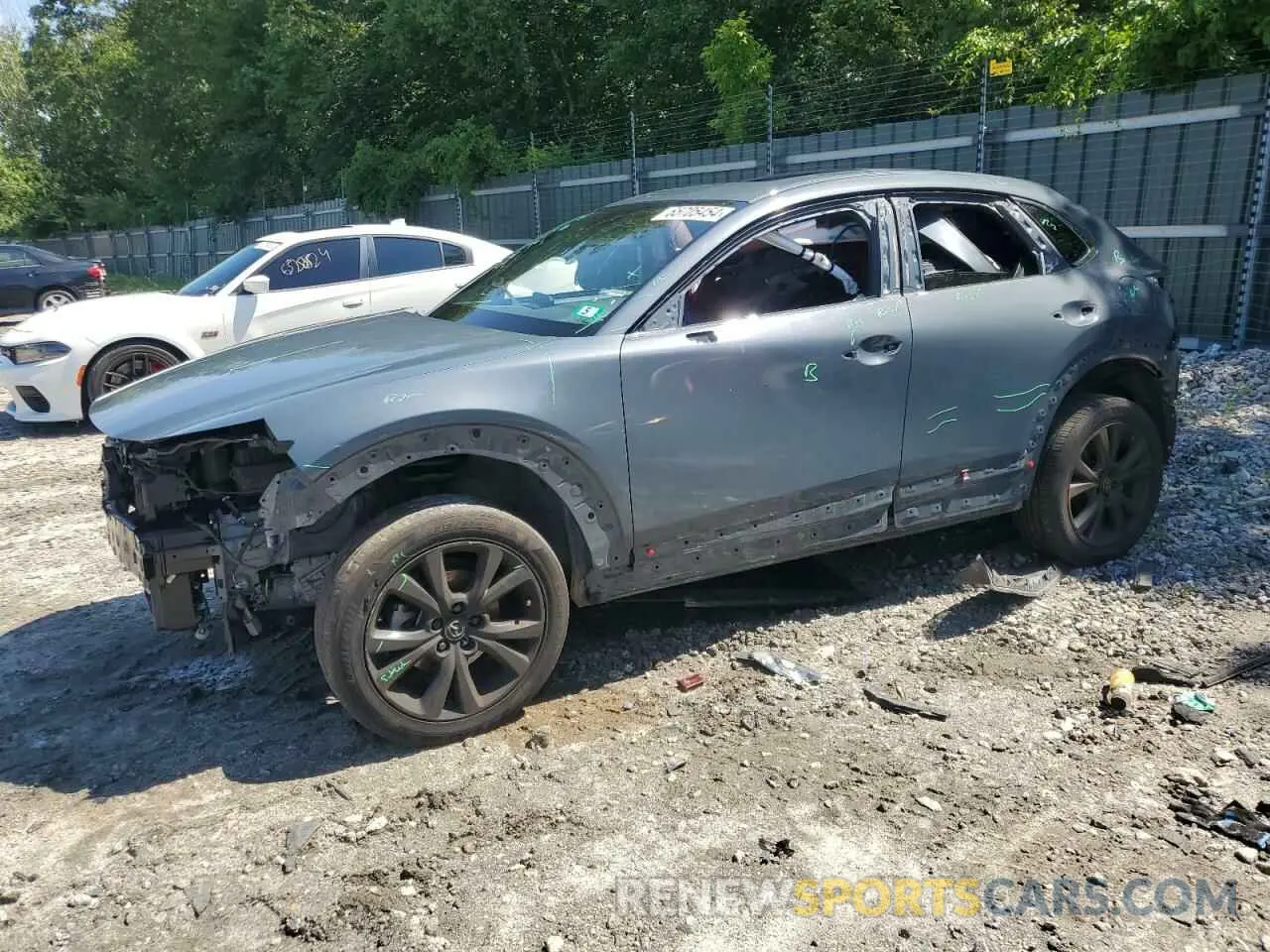 1 Photograph of a damaged car 3MVDMBCL5NM445733 MAZDA CX30 2022