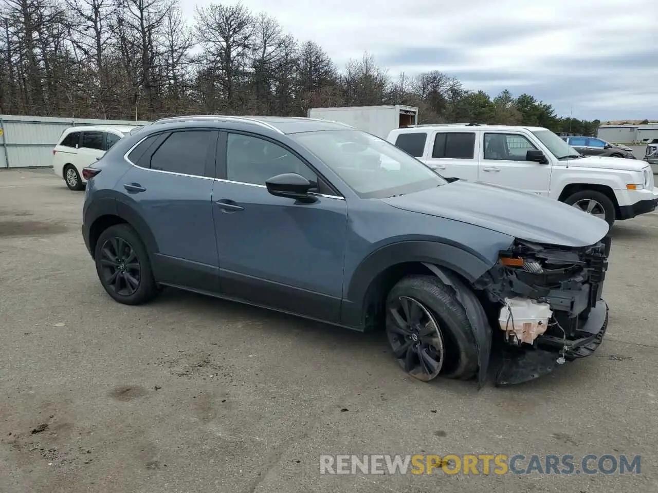 4 Photograph of a damaged car 3MVDMBCL6NM411302 MAZDA CX30 2022