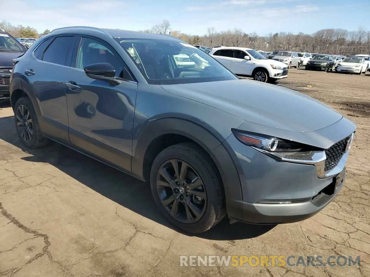 4 Photograph of a damaged car 3MVDMBCL7NM455308 MAZDA CX30 2022