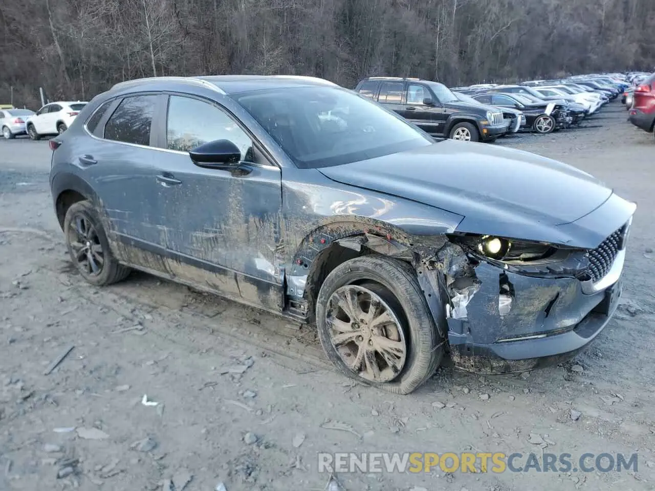 4 Photograph of a damaged car 3MVDMBCL8NM435374 MAZDA CX30 2022