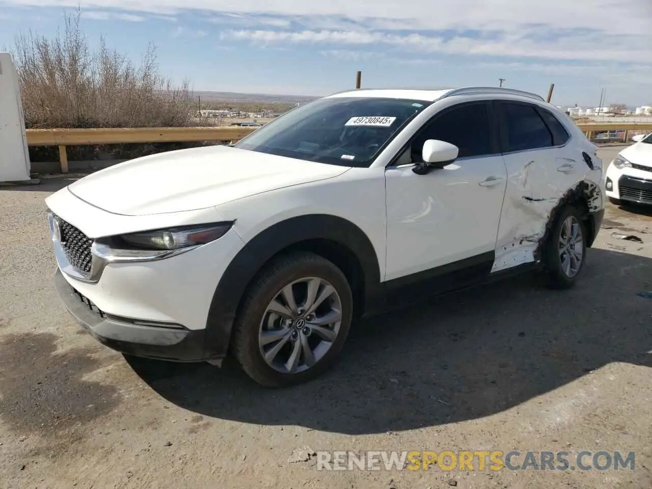 1 Photograph of a damaged car 3MVDMBCL9NM407843 MAZDA CX30 2022