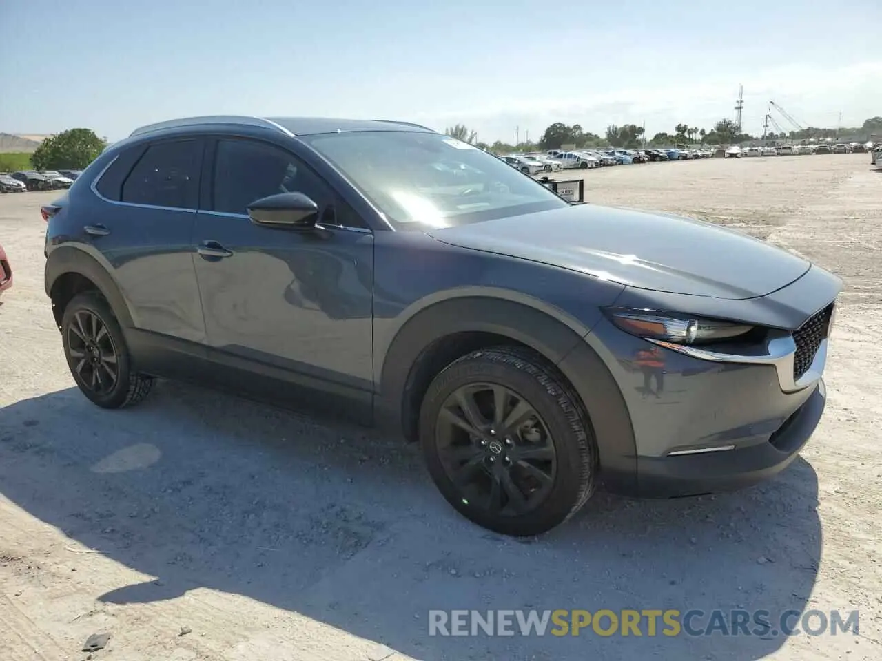 4 Photograph of a damaged car 3MVDMBCL9NM433987 MAZDA CX30 2022