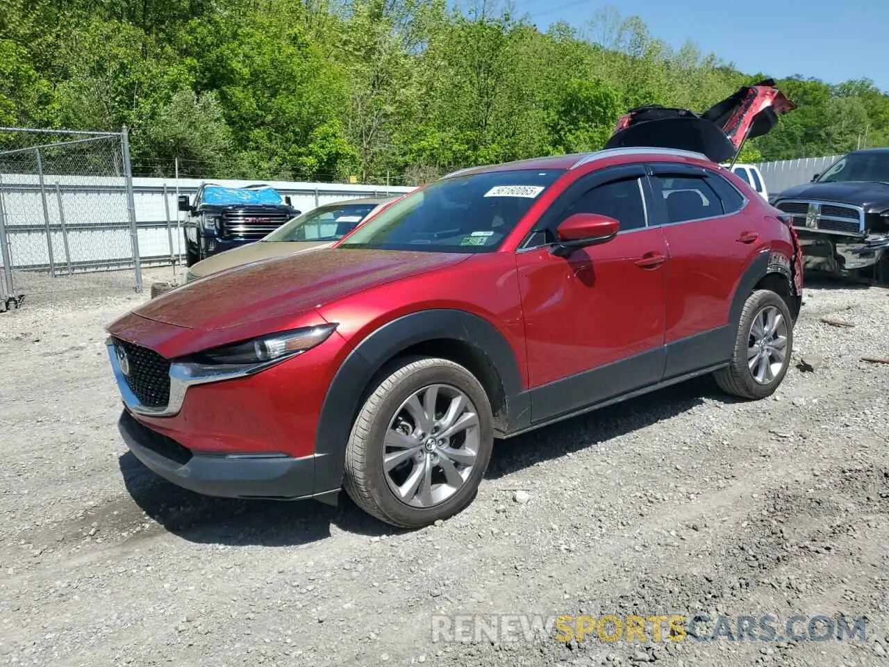 1 Photograph of a damaged car 3MVDMBCLXNM404384 MAZDA CX30 2022