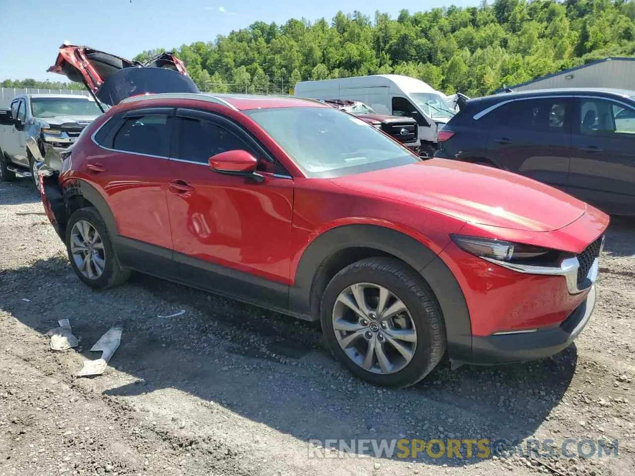 4 Photograph of a damaged car 3MVDMBCLXNM404384 MAZDA CX30 2022