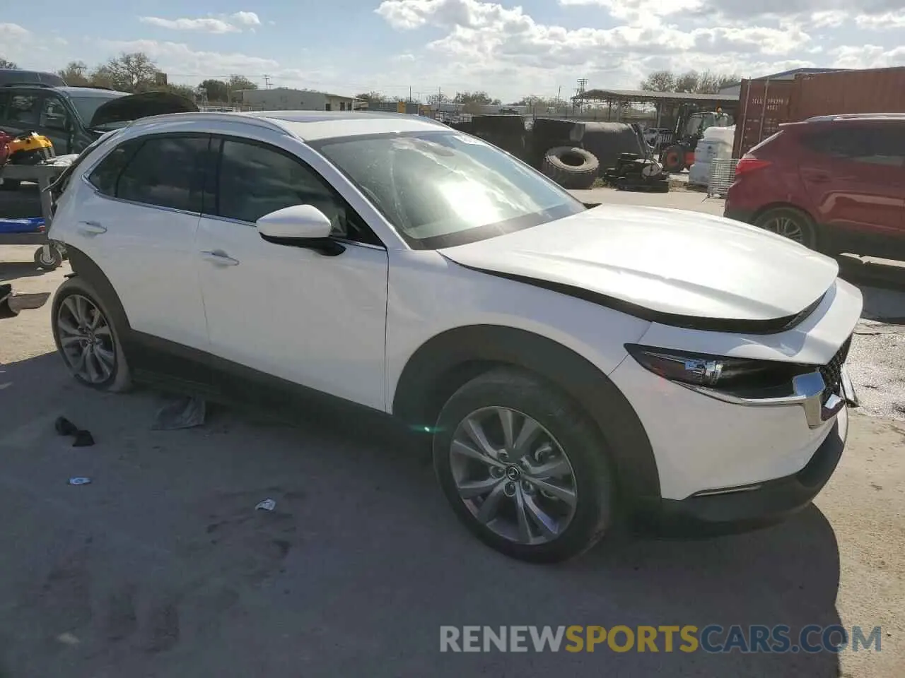 4 Photograph of a damaged car 3MVDMBDL2NM450693 MAZDA CX30 2022