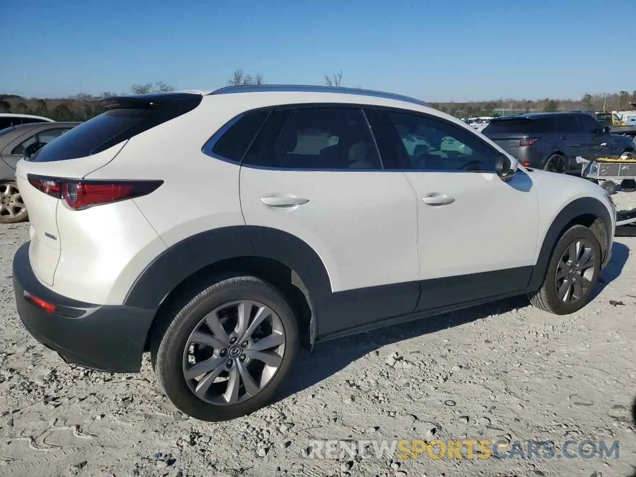 3 Photograph of a damaged car 3MVDMBDL8NM445479 MAZDA CX30 2022