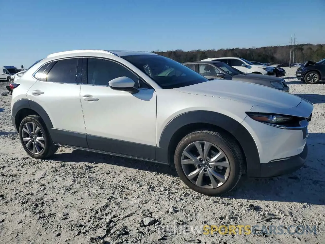 4 Photograph of a damaged car 3MVDMBDL8NM445479 MAZDA CX30 2022