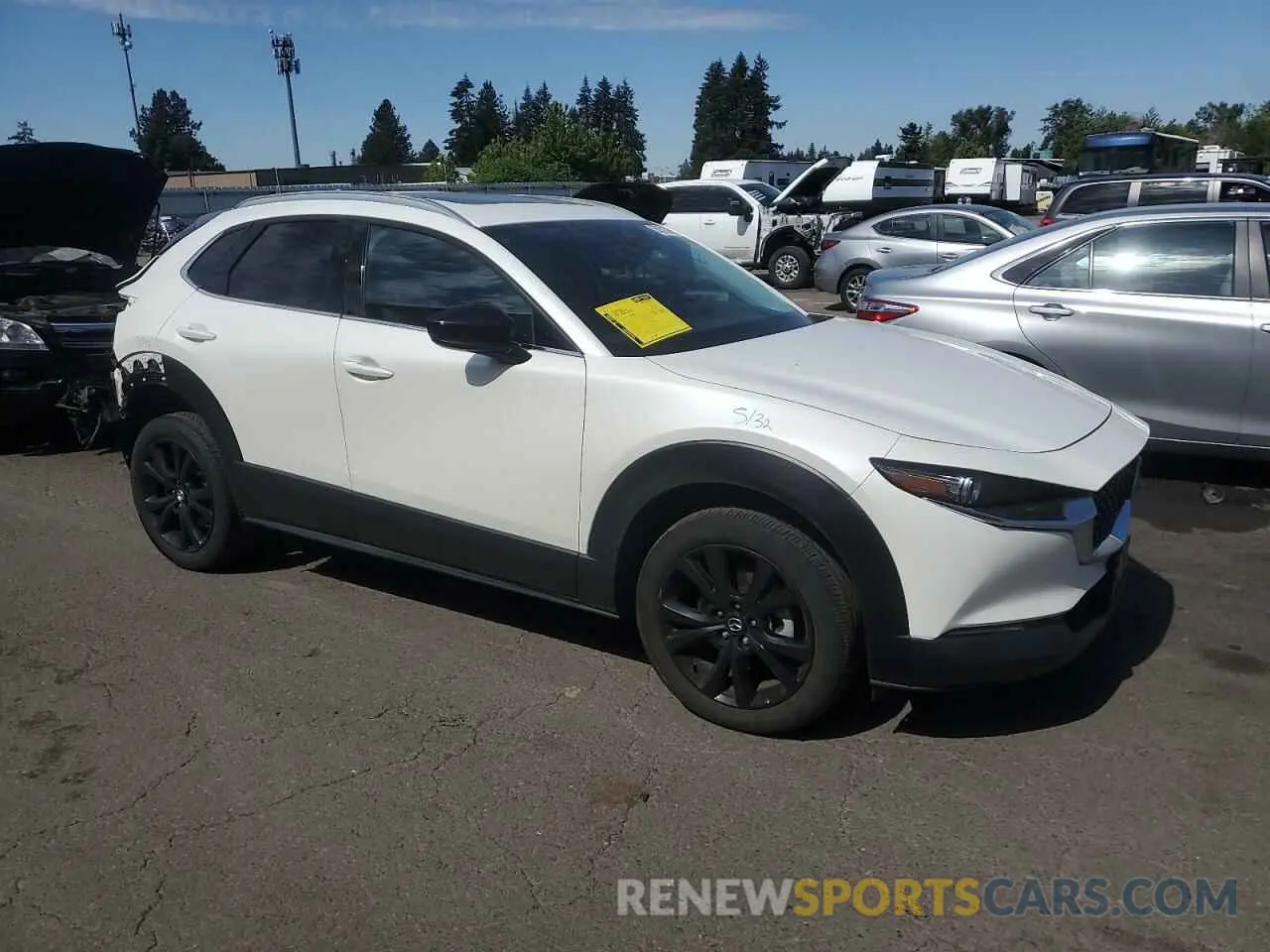 4 Photograph of a damaged car 3MVDMBDY4NM426830 MAZDA CX30 2022