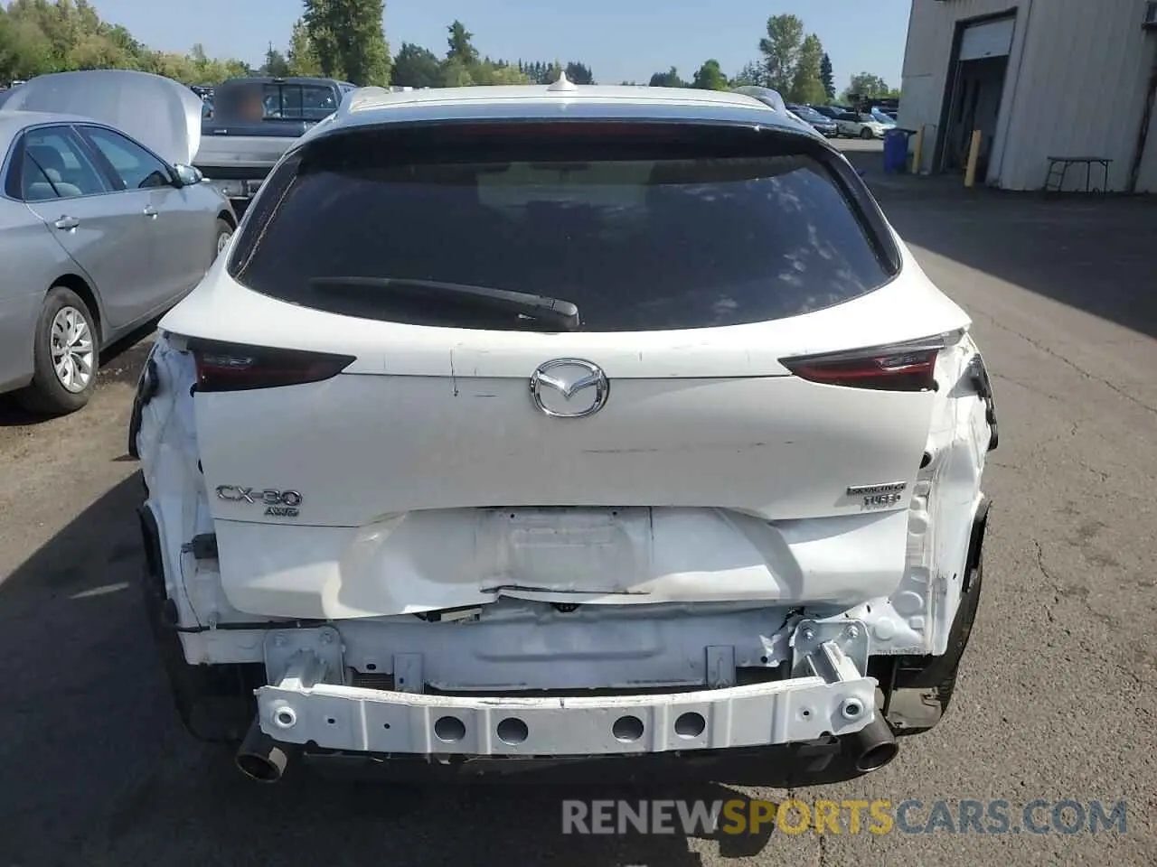 6 Photograph of a damaged car 3MVDMBDY4NM426830 MAZDA CX30 2022