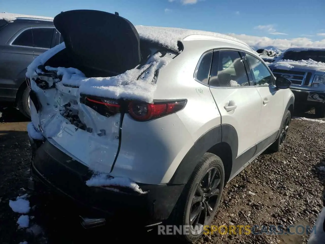 3 Photograph of a damaged car 3MVDMBDY8NM459488 MAZDA CX30 2022