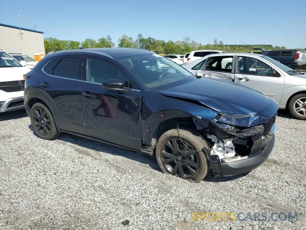 4 Photograph of a damaged car 3MVDMBDYXNM452798 MAZDA CX30 2022