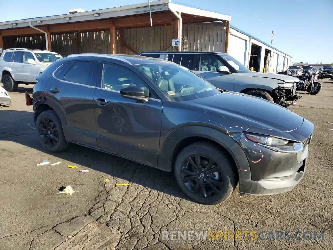 4 Photograph of a damaged car 3MVDMBEYXNM412364 MAZDA CX30 2022