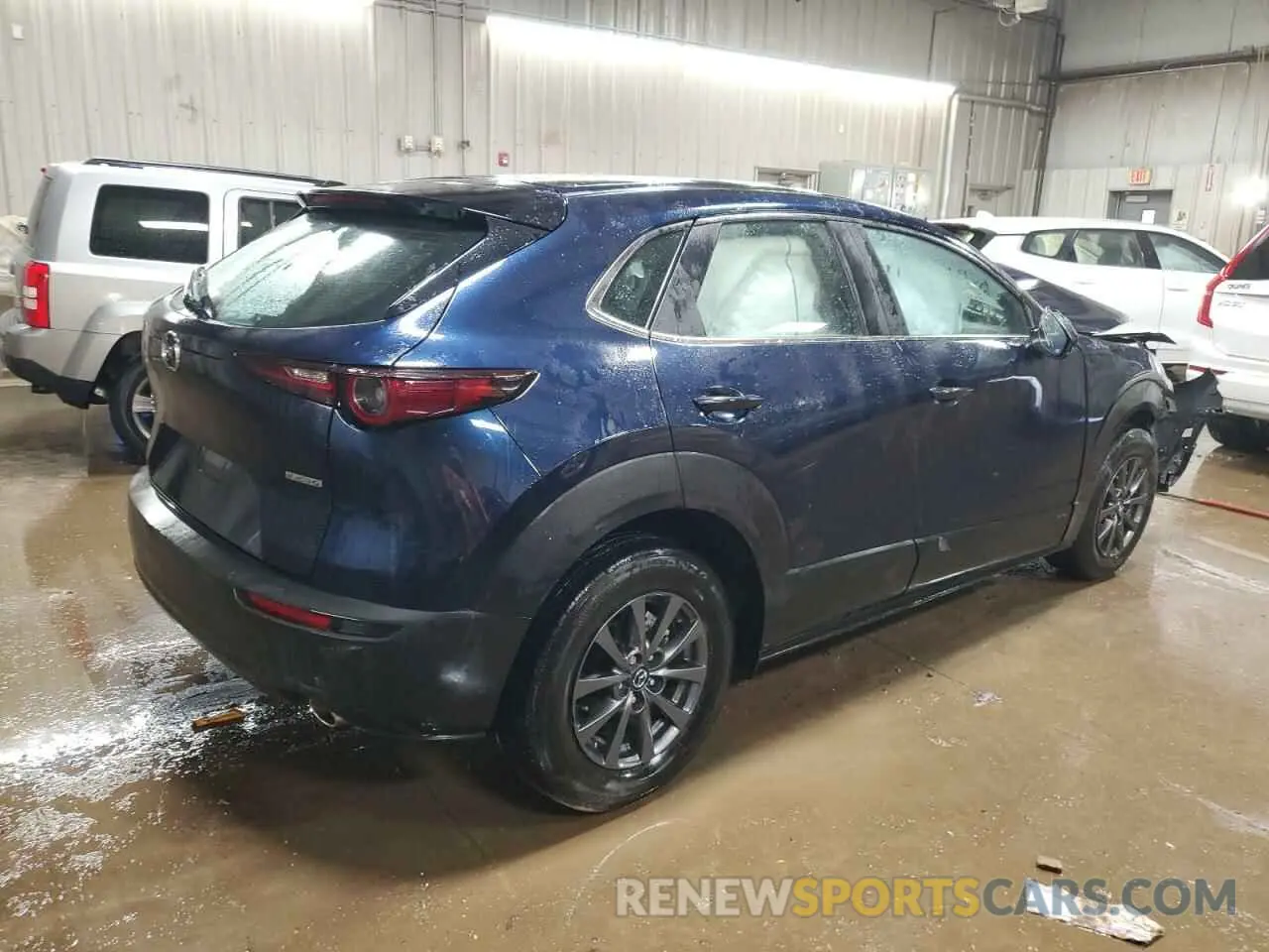 3 Photograph of a damaged car 3MVDMBAM1PM565897 MAZDA CX30 2023