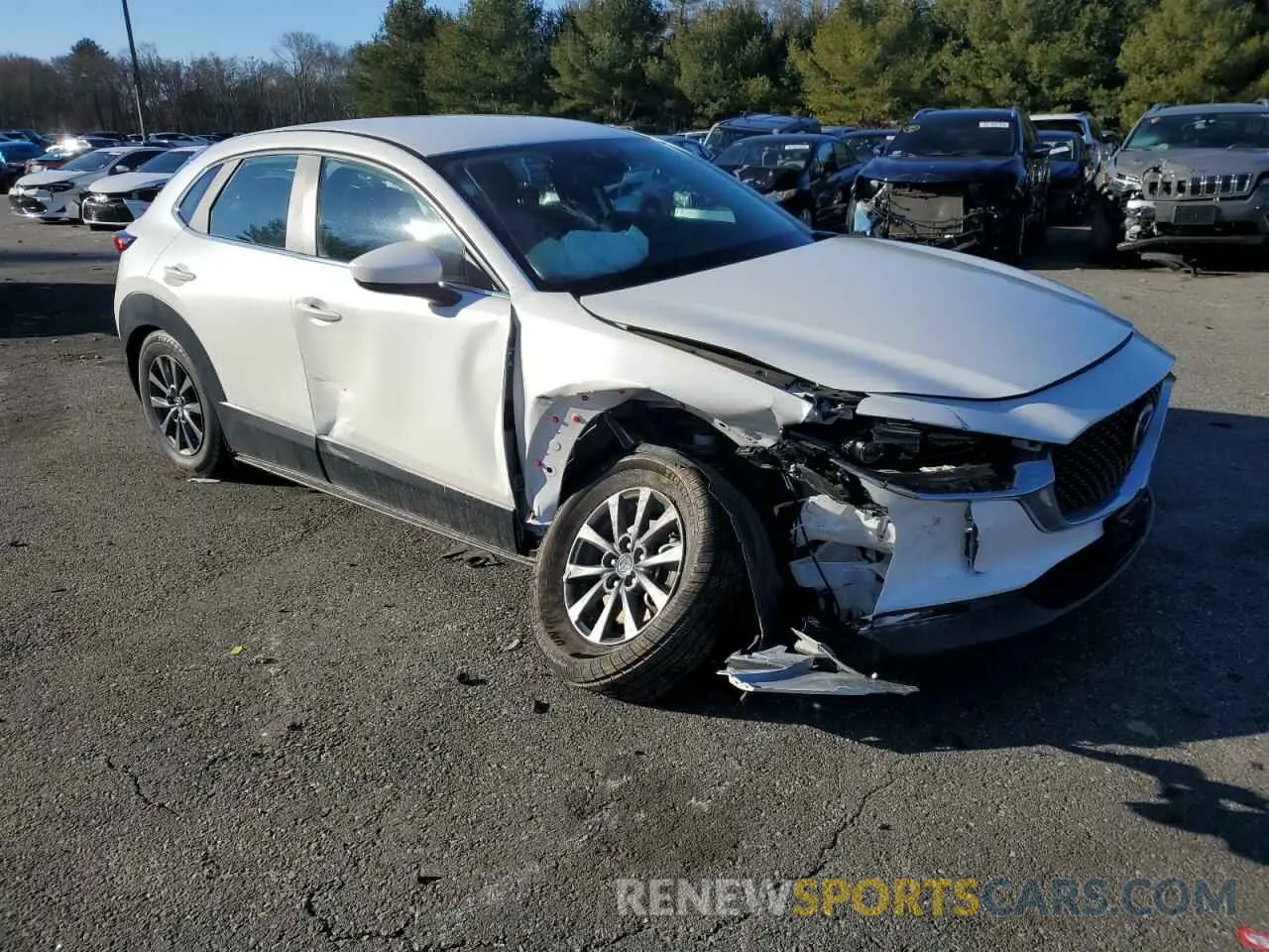 4 Photograph of a damaged car 3MVDMBAM9PM542965 MAZDA CX30 2023