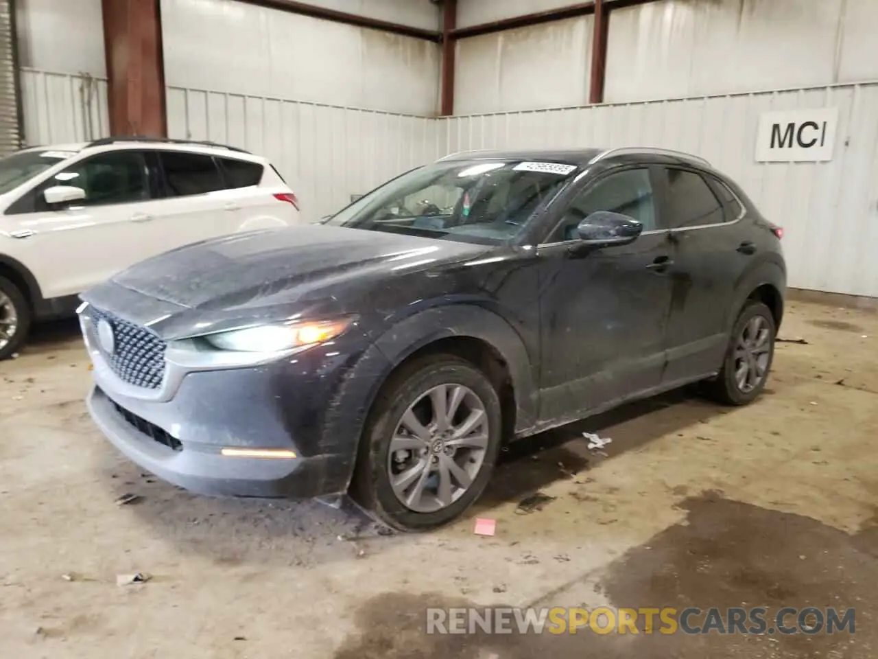 1 Photograph of a damaged car 3MVDMBBM0PM572399 MAZDA CX30 2023