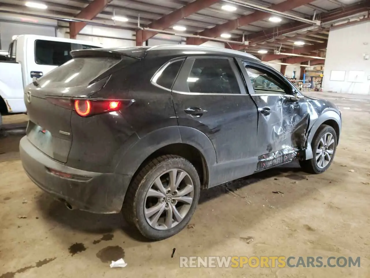 3 Photograph of a damaged car 3MVDMBBM0PM572399 MAZDA CX30 2023