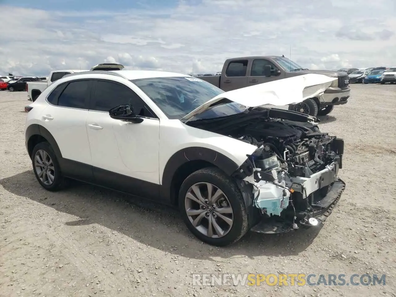 4 Photograph of a damaged car 3MVDMBBM1PM533398 MAZDA CX30 2023