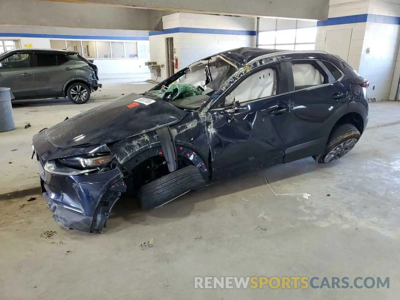 1 Photograph of a damaged car 3MVDMBBM1PM563758 MAZDA CX30 2023