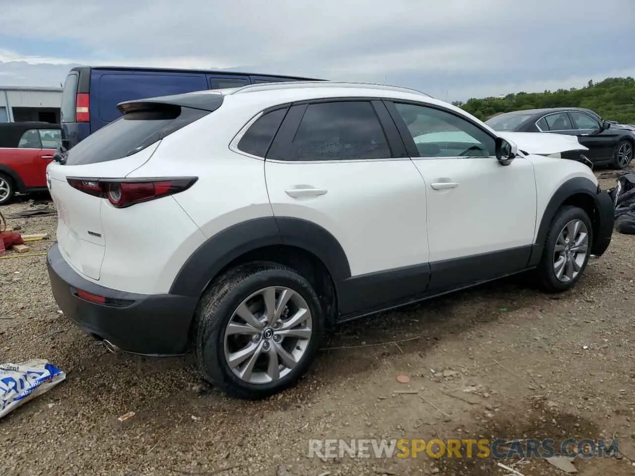3 Photograph of a damaged car 3MVDMBBM2PM555443 MAZDA CX30 2023