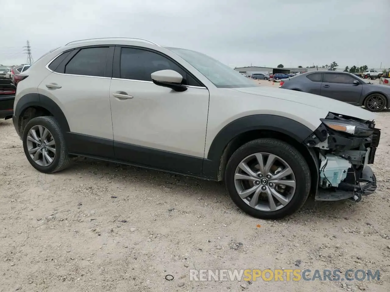 4 Photograph of a damaged car 3MVDMBBM4PM529734 MAZDA CX30 2023