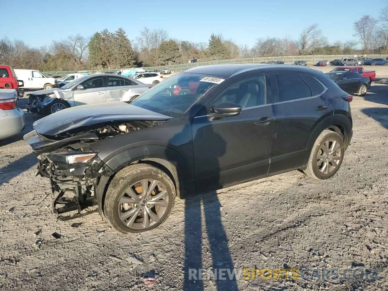1 Photograph of a damaged car 3MVDMBBM8PM543782 MAZDA CX30 2023