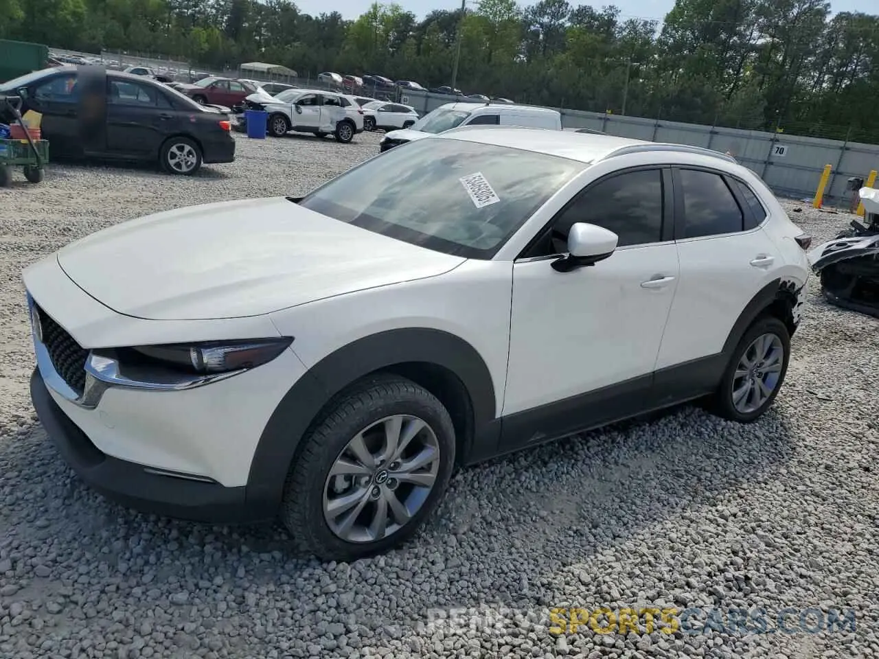 1 Photograph of a damaged car 3MVDMBBM8PM576779 MAZDA CX30 2023