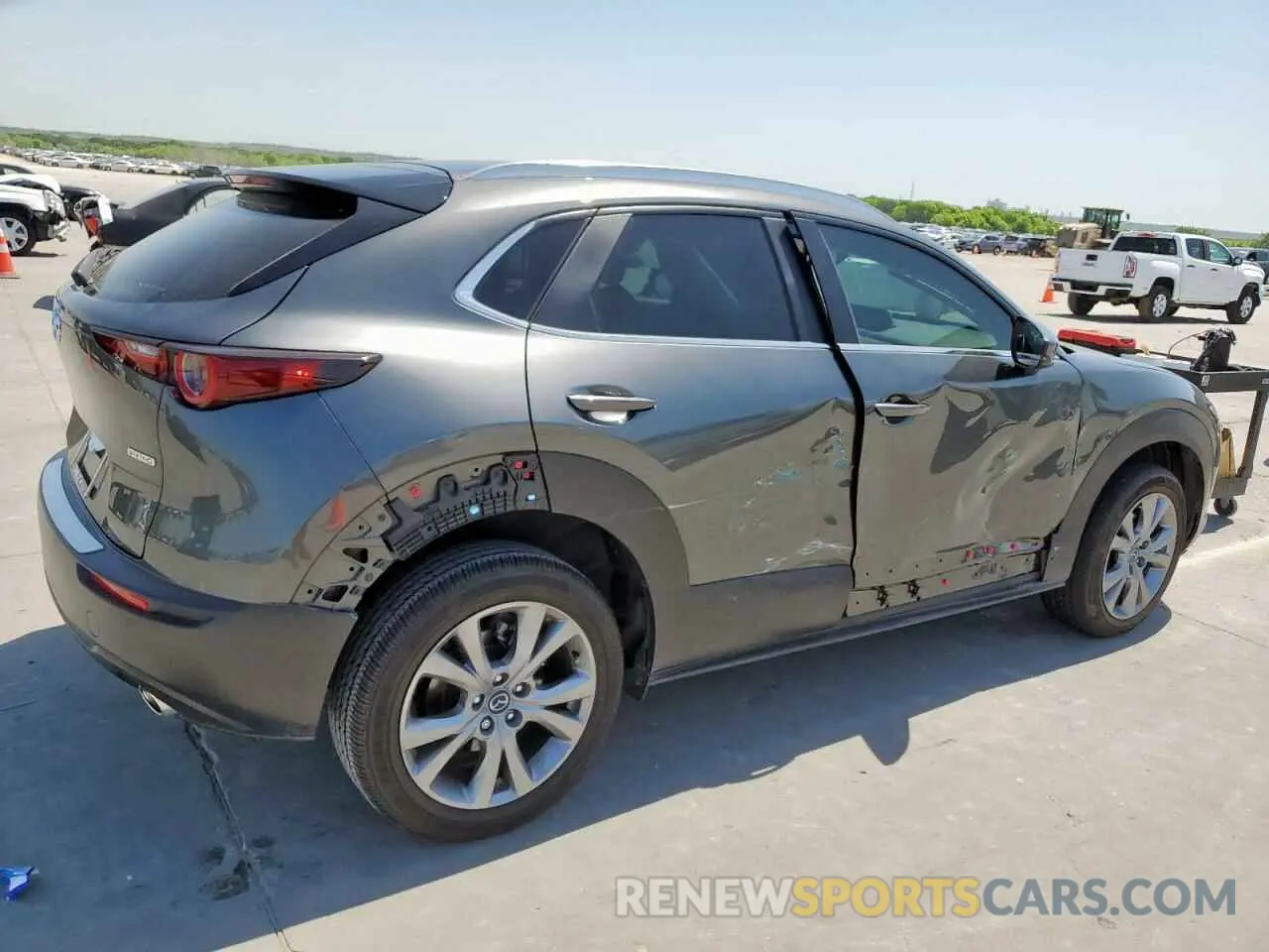 3 Photograph of a damaged car 3MVDMBBM9PM552085 MAZDA CX30 2023