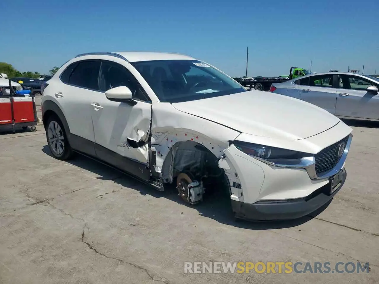 4 Photograph of a damaged car 3MVDMBBMXPM534260 MAZDA CX30 2023