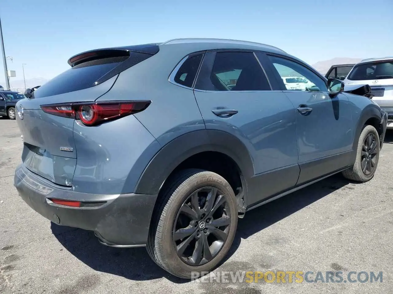 3 Photograph of a damaged car 3MVDMBCM0PM542768 MAZDA CX30 2023