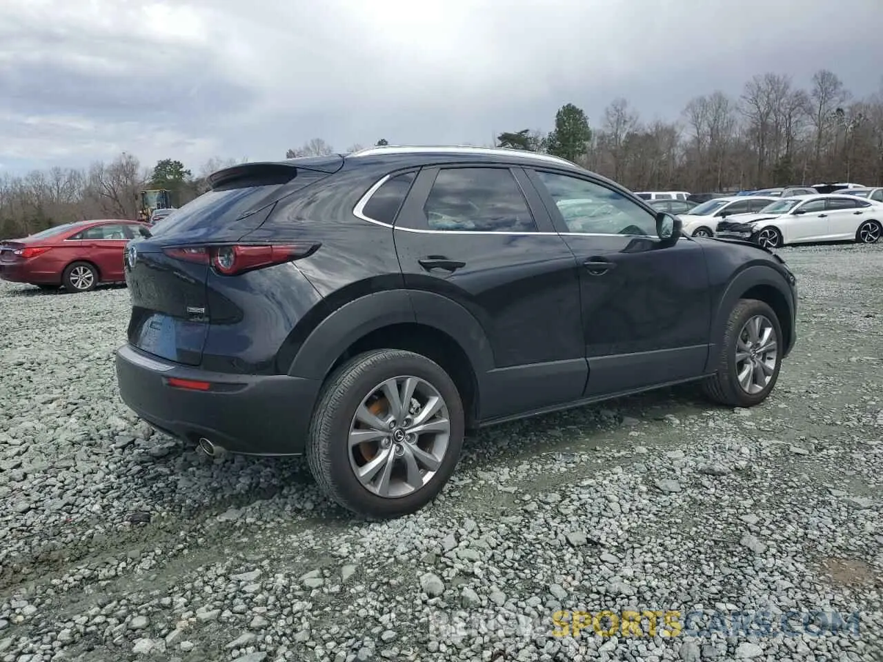 3 Photograph of a damaged car 3MVDMBCM0PM580114 MAZDA CX30 2023