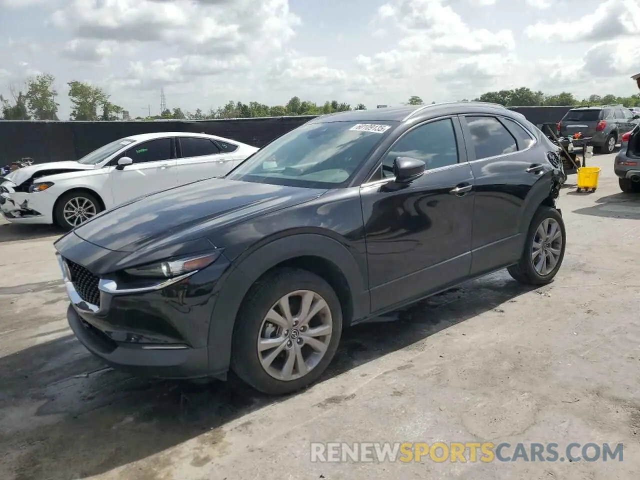 1 Photograph of a damaged car 3MVDMBCM2PM572015 MAZDA CX30 2023