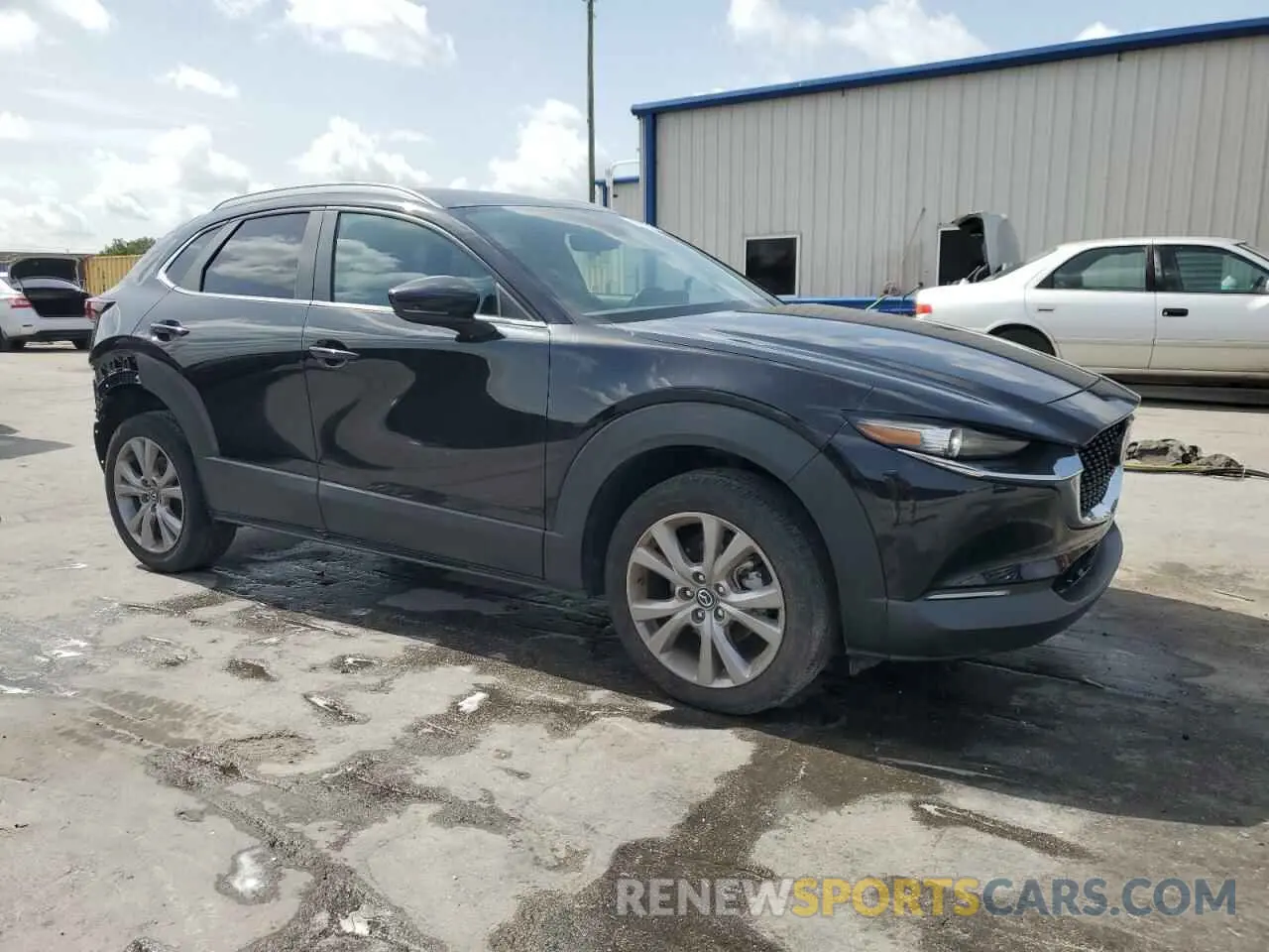 4 Photograph of a damaged car 3MVDMBCM2PM572015 MAZDA CX30 2023