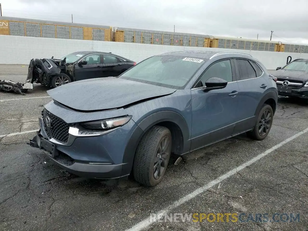 1 Photograph of a damaged car 3MVDMBCMXPM542809 MAZDA CX30 2023